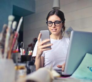 Small business owner sitting in her office working for accounting service and tax deductions